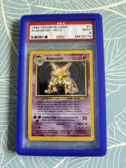 1999 POKEMON BASE SET UNLIMITED #1 ALAKAZAM-HOLO PSA 9 - Image 1