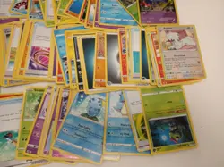 Large Assorted Pokemon Card Collection with Tins and Binder - Image 4