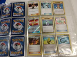Large Assorted Pokemon Card Collection with Tins and Binder - Image 5