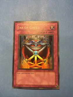Yu-Gi-Oh! Jar of Greed - LON-047 Super Rare NM-MINT Unlimited - Image 1