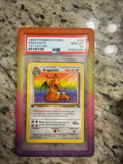 1999 POKEMON FOSSIL 1ST EDITION #19 DRAGONITE PSA 10 - Image 1