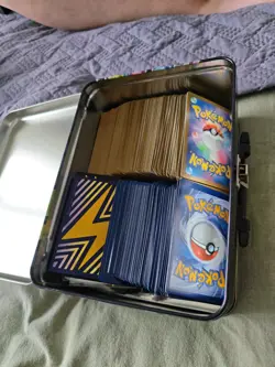 Mixed English and Japanese Bulk Pokemon Cards In Pikachu Tin Bundle - Image 1