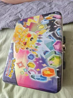 Mixed English and Japanese Bulk Pokemon Cards In Pikachu Tin Bundle - Image 2