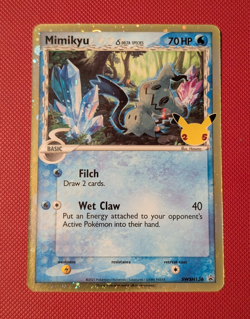 Pokemon TCG - Mimikyu Delta Species - Celebrations SWSH136 - Black Star Promo NM - Image 1
