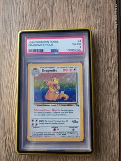 Vintage 1999 Pokemon TCG Dragonite 4/62 Holo Fossil PSA 4 WotC - Image 1