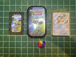 Pokemon TCG - Celebi collectors tin, Pokemon cards bundle (60 cards) (See desc.) - Image 1