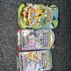 Pokemon Trading Cards Game Tin With Two Packs Of Trading Cards ￼￼ - Image 1