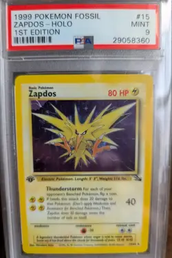 1999 Pokemon Fossil 1st Edition Zapdos 15/62 Holo PSA 9 - Image 1