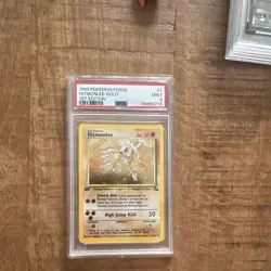 Pokemon Fossil 1999 Hitmonlee 7/62 1st Edition Holo PSA 9 English - Image 1