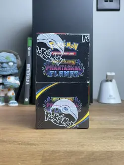 Pokemon TCG Mega Evolution Phantasmal Flames Sealed Half Booster Box (18 Packs) - Image 1