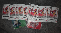 Round 1 One Piece Trading Card Game Promo Lot of 10 Packs + 2 Keychains + Hat - Image 1