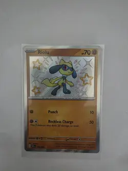 Pokemon Riolu TCG Scarlet & Violet Paldean Fates Holo Card 173/091 - Image 1