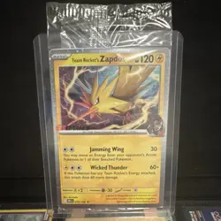Pokemon TCG Team Rocket’s Zapdos 070/182 EB Games Exclusive! NM (sealed) - Image 1