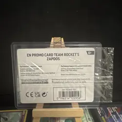 Pokemon TCG Team Rocket’s Zapdos 070/182 EB Games Exclusive! NM (sealed) - Image 2