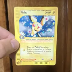 Pichu 12/111 Neo Genesis Holo Rare Pokemon TCG Card English 2000 30 HP - Image 1