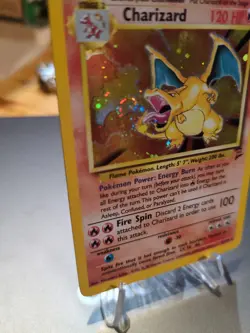 Charizard 004/130 Base Set 2 Holo SWIRL Rare Pokemon Card - Image 3