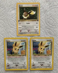 Pokemon TCG Eevee Lot of 3 1st Edition Team Rocket 55/82 Neo Discovery38/75 NM/M - Image 1