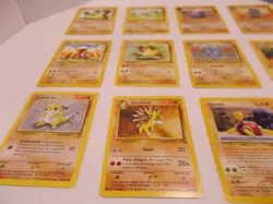 Pokemon Card of 15 Cards - Marowak, Omastar, Onix, Rhydon, Trapinch - Lot #44 - Image 5