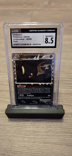 CGC 8.5 NM/MINT+ Umbreon Prime 86/90 Undaunted Holo Pokemon Card - Image 1