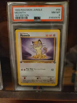 1st Edition 1999 Pokemon Jungle Meowth PSA Grade 8. - Image 1