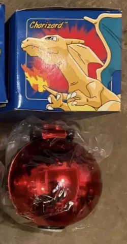 1999 Pokemon Charizard 23K Gold Plated Card & Pokeball SEALED From Burger King - Image 1