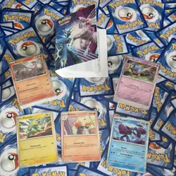 2x Bundles of 50 Pokemon Trading cards with a mini binder - Image 1