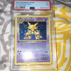 1999 Pokemon TCG Alakazam 1/102 Base Set Shadowless 1st Ed Holo PSA - Image 1