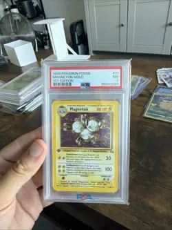 Pokemon Fossil 1st Edition Holo Rare Magneton 11/62 PSA 7 Near Mint WOTC Card - Image 1