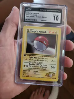 (POP 23) CGC 10 GEM MINT Lt. Surge's Voltorb 84/132 1st Edition Pokemon Card - Image 2