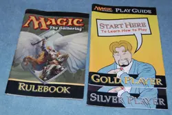 Magic The Gathering Rule Book & Play Guides (2, Gold & Silver), Softcover, 2005 - Image 1