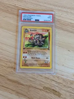 Pokemon 1999 Fossil 1st Edition Graveler PSA 9 - Image 1