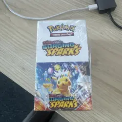 Pokemon Surging Sparks Half Booster Box 18 Packs Factory Sealed (rip on side) - Image 1