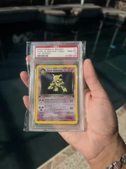 2000 POKEMON ROCKET DARK ALAKAZAM - HOLO 1ST EDITION PSA 10 - Image 1