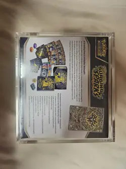 Surging Sparks Pokemon Center ETB - Acrylic Case Included - Sealed 2 Small Tears - Image 2