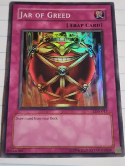 Jar of Greed Yugioh LON-047 Unlimited LP Super Rare - Image 1