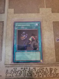 YUGIOH CONFISCATION MRL-038 SUPER 1ST ED VLP 1996 - Image 1