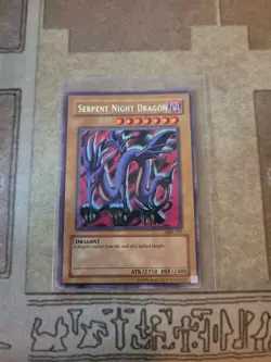 YUGIOH SERPENT NIGHT DRAGON MRL-103 SECRET UNLIMITED ED MP 1996 - Image 1