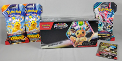 Pokemon Scarlet & Violet LOT Prismatic Evolutions Surprise Box & 4 Single Packs - Image 1