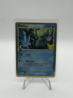 Pokemon TCG Mimikyu (Delta Species Celebrations) SWSH136 Black Star Promo MINT - Image 1