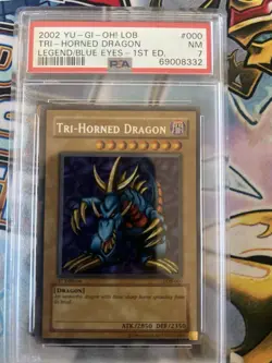 YuGiOh Tri-horned Dragon Lob-000 1st NM PSA 7 - Image 1
