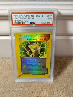 PSA 7 NM 2003 POKEMON AQUAPOLIS SET LIGHTNING CUBE 01 REVERSE HOLO CARD 127/147 - Image 1