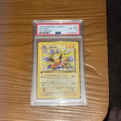 Pokemon TCG Jolteon Jungle 1st Edition Non-Holo Card 20/64 PSA 8 slab - Image 1