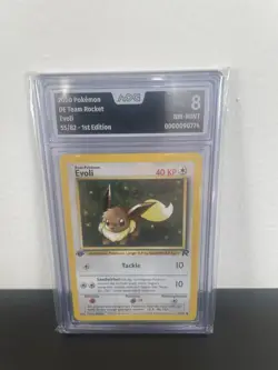 Pokemon Eevee Evoli 55/82 Team Rocket Grade AOG 8 1st Edition Near Mint/Mint - Image 1