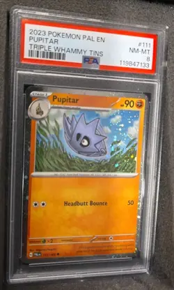 POKEMON CARD PUPITAR 111 TRIPLE WHAMMY TIN PROMO #111 PAL EN GRADED PSA 8 - Image 2