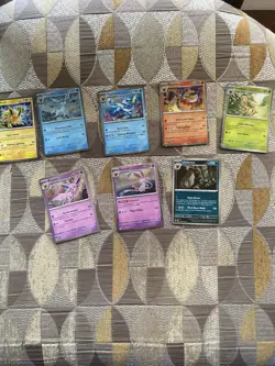 Pokemon Prismatic Evolutions Costco Mini Tins Cosmo Promo Cards (8 Cards Total) - Image 1