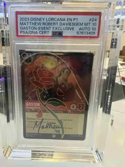 PSA10 / AUTO 10 Gaston - Arrogant Hunter 24 Disney Lorcana Promo Cards Cold Foil - Image 1