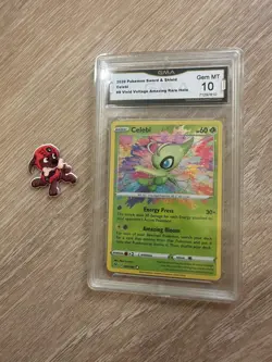 2020 POKEMON SWORD & SHIELD VIVID VOLTAGE CELEBI AMAZING RARE GMA 10 - Image 1