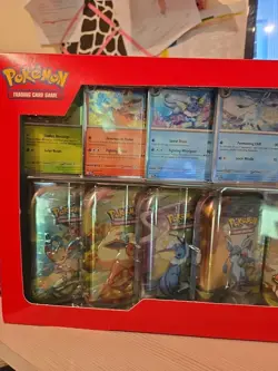 Pokemon TCG Scarlet & Violet Prismatic Evolutions 8 Mini-Tin Bundle U Opened - Image 2