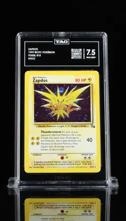 Zapdos 1999 WOTC Pokemon Fossil #15 Holo (Cosmo Holo) TAG Grade 7.5 - Image 1