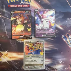 Pokemon 25th Anniversary Card Lot: Lance's Charizard V, Dark Sylveon V, Zacian X - Image 1